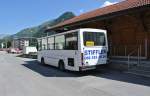NAW/Hess als Schülerbus beim Bahnhof Davos Dorf, 23.08.2012.
