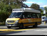 Postauto - Mercedes Sprinter  VD 603814 unterwegs vor dem Bahnhof in Yverdon am 21.10.2023