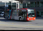 Chur Bus - Mercedes Citaro  GR  97501 unterwegs bei den Bushaltestellen vor dem Bahnhof in Chur am 19.02.2021