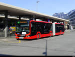 Chur Bus - MAN Lion`s City Hybrid  GR 155854 unterwegs bei den Bushaltestellen vor dem Bahnhof in Chur am 19.02.2021