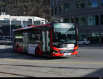 Chur Bus - MAN Lion`s City Hybrid  GR 155856 unterwegs bei den Bushaltestellen vor dem Bahnhof in Chur am 19.02.2021