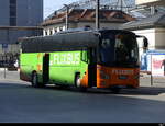 Flixbus - VDL Futura vor den Bahnhof in Chur am 05.03.2023