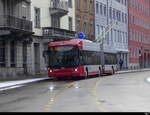 Stadtbus Winterthur - Hess Trolleybus Nr.104 unterwegs bei leichtem Schneefall in Winterthur am 2023.01.22