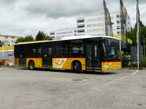 Postauto - Mercedes Citaro  JU 61305 abgestellt auf einem Parkplatz in Delemont am 08.09.2013