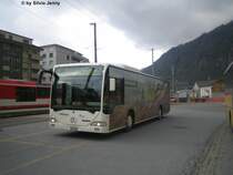 Citaro VS 241 961 ''B�ckerei Volken'' am 23.4.08 in Brig, Bahnhof. Der Ortsbus von Brig wird durch Postauto betrieben, obwohl die Fahrzeuge g�nzlich mit Werbung zugekleistert sind.