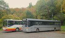 Ein Mercedes-Benz O 407 und O 408 von Busverkehr Imfeld, abgestellt auf einem Gro�parkplatz f�r Park-and-Ride-Busse am 20.10.2013.
