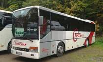 Ein Setra S315 UL von Trischan Reisen aus Kandel, abgestellt auf einem Gro�parkplatz f�r Park-and-Ride-Busse am 20.10.2013.