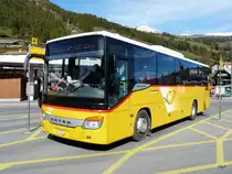 Postauto - Setra GR 75000 auf dem Bahnhofsplatz in Scuol-Tarasp am 18.10.2013