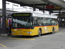 Postauto - Mercedes Citaro AG 8965 unterwegs auf der Linie 361 bei den Bushaltestellen vor dem Bahnhof Brugg am 24.10.2013