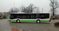 Der PM-E 244 ist einer der ersten 5 Mercedes-Benz O 530 III C2 Ü der Verkehrsgesellschaft Belzig und im ganzen Land Brandenburg, hier am 22.11.13 am Bad Belziger Bahnhof.