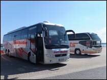 Volvo 9700 von August Becker aus Deutschland und Neoplan Cityliner von Haupts aus Deutschland im Stadthafen Sassnitz am 28.04.2013