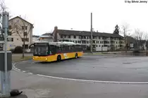 Postauto/PU Motrag Nr. 288 (MAN A21 Lion's City) am 9.2.2014 beim Bahnhof Oberwinterthur