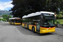 AutoPostale della Capriasca, Tesserete. 2 Scania/Hess K320UB (links TI 211'039, rechts TI 248'837) in Tesserete, Stazione. (26.6.2012)