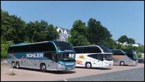 Neoplan Cityliner von Kohler aus Deutschland und Neoplan Cityliner von ETK-Reisen aus Deutschland und Setra 415 HDH von Burow aus Deutschland im Stadthafen Sassnitz am 20.06.2013