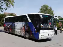 Mercedes Tourismo mit Werbung für die RhB in der Stadt Zürich am 19.07.2014
