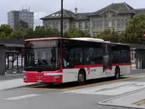 Travys - MAN Lion`s City  VD 1257 bei den Bushaltestellen beim Bahnhof von Yverdon les Bains am 20.07.2014