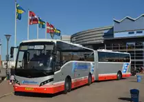 Ein Gråhundbus,  Volvo Gelenkzug  VDL Jonckheere Mistral aus belgischer Produktion. Steht am Hafen von Ystad/Schweden und wartet auf seine Fahrgäste von der Insel Bornholm. Gesehen am 22.07.2014.