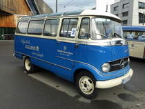 Reisebus Oldtimer Mercedes O 319 auf einem Parkplatz eines Einkauf Center in Bern Brünnen am 25.10.2014
