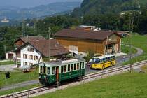 SAURER POSTAUTO: SAURER-FRONTLENKER auf Sonderfahrt anlässlich einer Begegnung mit dem Ce 2/2 12, 1907 (ex OJB/LJB) der Museumsbahn Blonay Chamby bei Cornaux-Chamby am 8. September 2012.
Foto: Walter Ruetsch