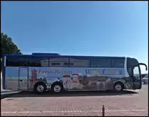 Scania OmniExpress von F�rst-Reisen/Weltenbummler aus Deutschland im Stadthafen Sassnitz am 10.08.2013