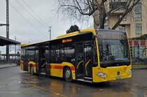 Mercedes Citaro mit der Betriebsnummer 65 auf der Linie 60 wartet am Bahnhof Muttenz. Die Aufnahme stammt vom 09.12.2014.