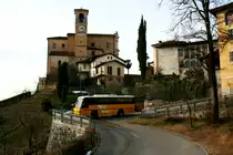 Ein Neoplan 312K Postauto auf dem Kurs 62.428 Novaggio - Ponte Tresa in Castelrotto; 31.01.2015