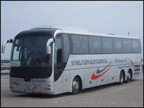 MAN Lion's Coach von Strelitzer Bustouristik aus Deutschland im Stadthafen Sassnitz am 30.08.2013