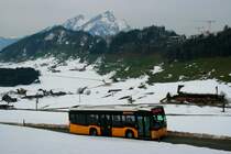 Ein Mercedes-Benz O 530 III Citaro Postauto auf dem Kurs 60.321 Stansstad - Bürgenstock kurz vor der Station Bürgenstock. Das Foto mit dem Pilatus im Hintergrund muss ich mal bei schönem Wetter wiederholen; 21.02.2015
