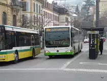 TransN - Mercedes Citaro Nr.323  NE  106323 unterwegs auf der Linie 422 in der Stadt Neuchâtel am 07.02.2015