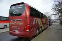 Dieser Neoplan Cityliner (HRO-K 776) steht am 17.01.2015 am S-Bahnhof Olympiastadion.
