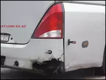 Ein wenig kaputt...Neoplan Starliner von Kristlanstad Buss aus Schweden im Stadthafen Sassnitz am 15.09.2013