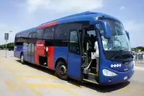 Italien / Sardinien: Scania Irizar des Unternehmens  ARST - TRASPORTI REGIONALI DELLA SARDEGNA , aufgenommen im Juni 2014 am Flughafen  Alghero Airport .