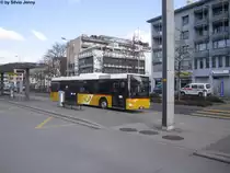 Postauto/Regie Hausen am Albis Nr. 186 (MAN A20) am 27.3.2015 beim Bhf. Affoltern am Albis.