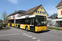 Postauto/Regie Zürcher Unterland Nr. 164 (MAN A23) am 14.4.2015 in Bülach, Sonnenhof, unterwegs als Schulbus. 