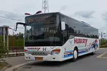 . HU 3009, Setra S 415 UL des Busunternehmens Huberty aus Rodange, in der neuen Farbgebung und mit neuem Logo, aufgenommen am Bahnhof in Rodange am 29.04.2015.