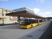 Postauto/PU Vögtlin-Meyer Nr. 122 (MAN A23 Lion's City GL) am 6.5.2015 beim neuen Bahnhof Brugg/Campus.