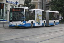 Mercedes-Benz O 530 III(Citaro 2.Generation)mit Minions-Werbung als Linie 25 von Doberaner Platz nach Thomas-Morus-Str in der Haltestelle Doberaner Platz,Rostock.04.09.2015