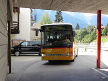 Postauto - Setra S 313 UL  VS  241975 bei der zufahrt beim Bahnhof Fiesch am 06.09.2015