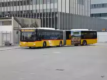 Postauto - MAN Lion`s City  BE 610548 in Bern bei den Postautohaltestellen auf dem Dach des Bahnhof Bern am 23.10.2015