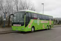 MAN Lion's Coach stand am 11.12.2015 mit Rostock rockt-Aufkelber in H�he Rostock Hauptbahnhof/S�d abgestellt