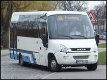 Iveco Kleinbus der Kraftverkehrsgesellschaft mbH Ribnitz-Damgarten in Stralsund am 22.03.2014
