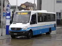 Will Mobil - Mercedes Nr.213  SG  381889 unterwegs auf der Linie 733 vor dem Bahnhof in Will am 29.11.2015