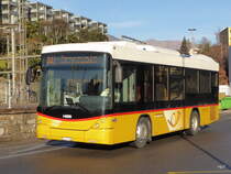 Postauto - Scania-Hess TI 214652 unterwegs in Lugano am 25.12.2015