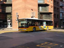 Postauto - Setra  TI 69460 unterwegs in Lugano am 25.12.2015