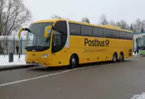 Postbus Scania OmniExpress stand als Linie 60 von Warnem�nde nach  K�ln/Bonn Flughafen in H�he Rostock Hbf/S�d.16.01.2016 