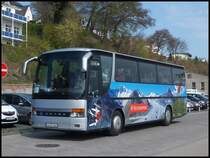 Setra 312 HD von Holiday Reisen aus Deutschland (ex Ruffiner/Schweiz) im Stadthafen Sassnitz am 20.04.2014