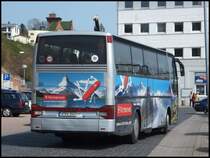 Setra 312 HD von Holiday Reisen aus Deutschland (ex Ruffiner/Schweiz) im Stadthafen Sassnitz am 20.04.2014