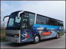 Setra 312 HD von Holiday Reisen aus Deutschland (ex Ruffiner/Schweiz) im Stadthafen Sassnitz am 20.04.2014