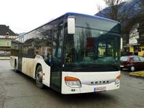 Setra S 415 NF von Siebler Reisen unterwegs auf der Kfl. 5021 als Kurs 11 (Oberdrauburg Bahnhof - Greifenburg Gemeindeamt) am 3.2.2016 beim MPREIS nahe der Haltestelle Dellach im Drautal West.