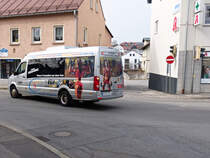 VW Crafter Bus mit scharfer Werbung. Regen 19.03.2016